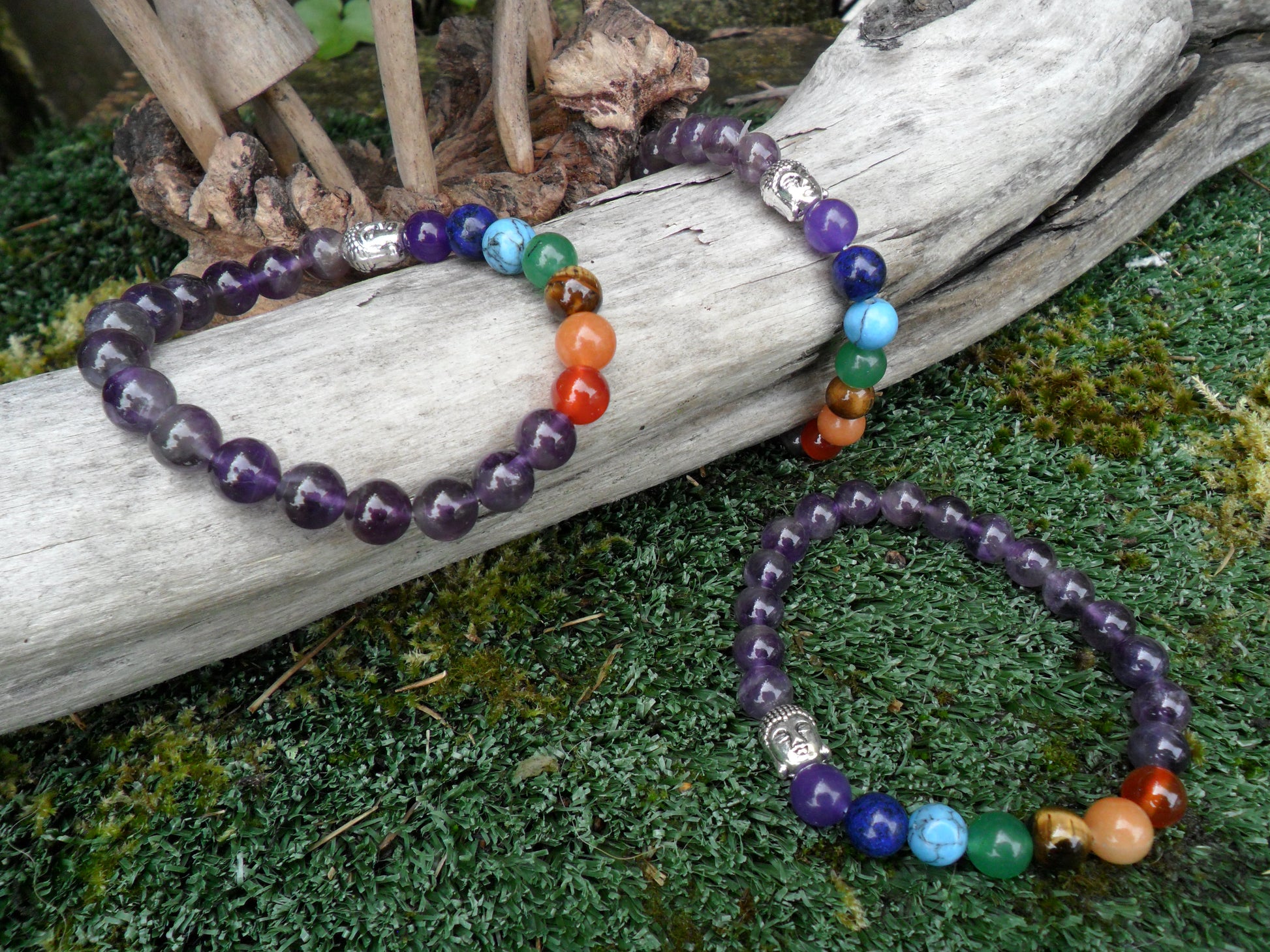 Chakra bracelet with amethyst beads and buddha head charm